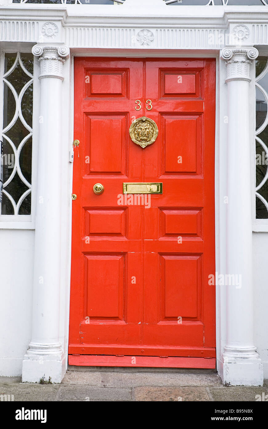 Ireland, Dublin, doorway with red painted door and white