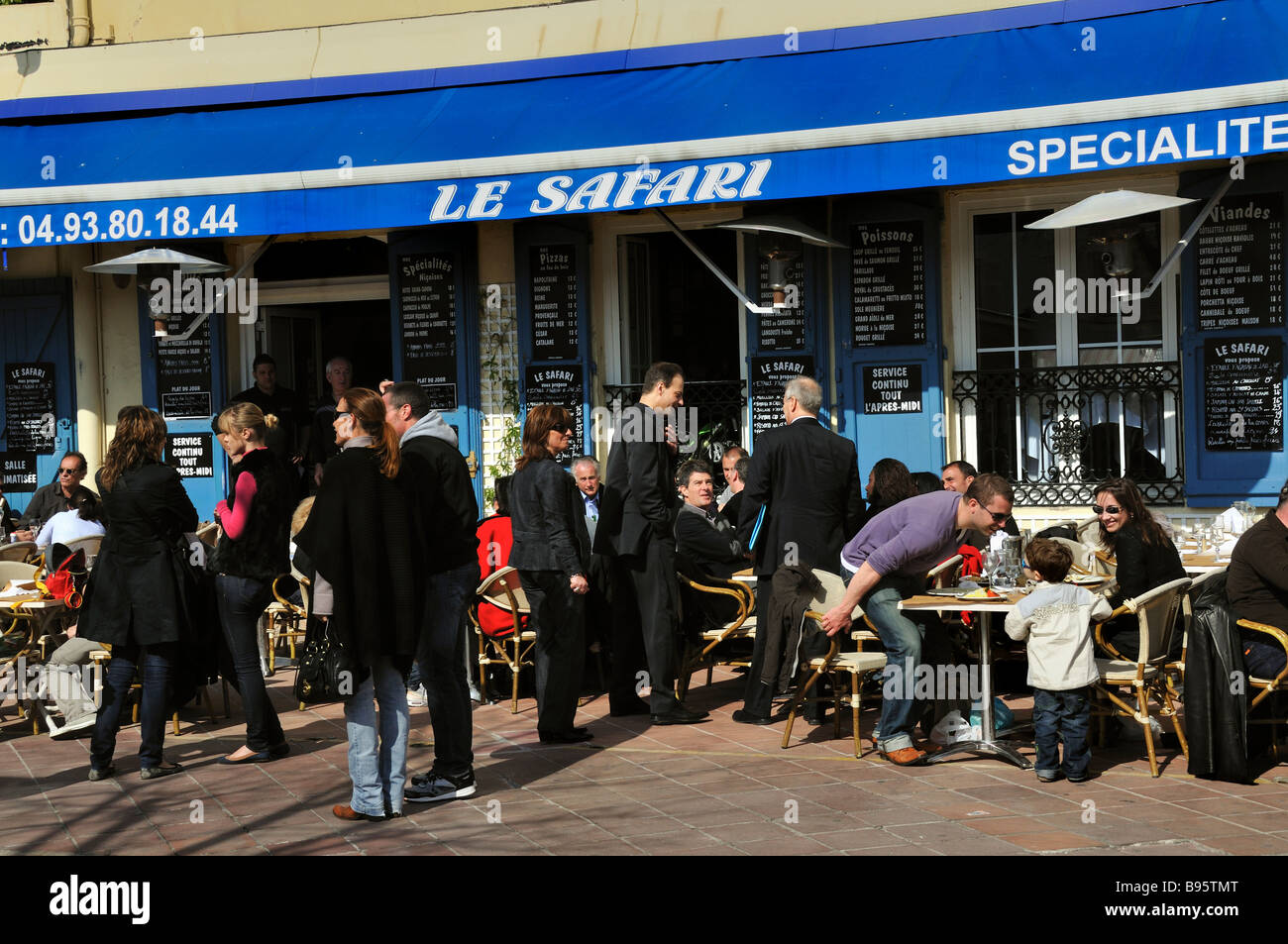 Nice France, French Café Brasserie Restaurant Bar, Sidewalk Crowded terrace 'Le Safari' Front Stock Photo