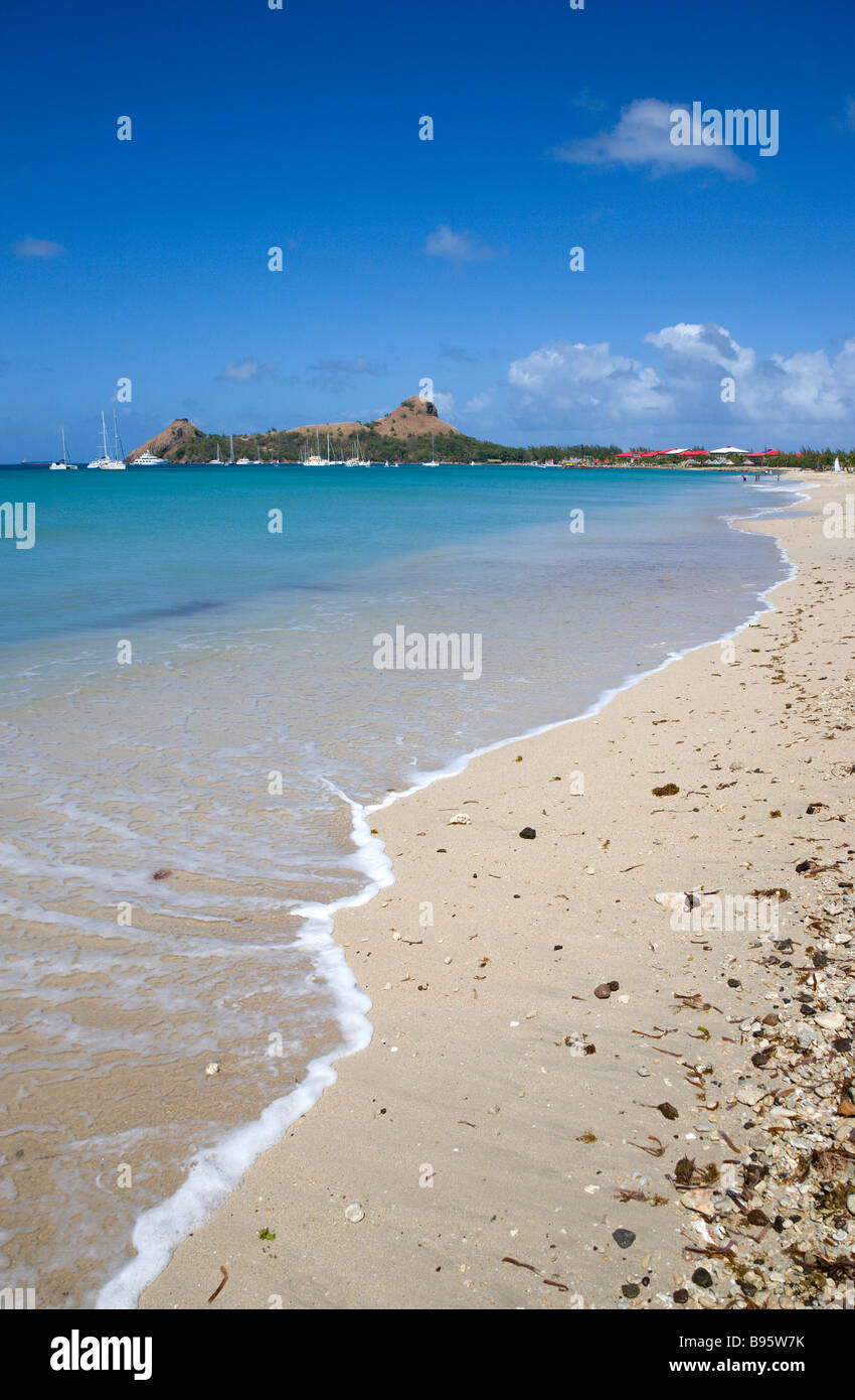 WEST INDIES Caribbean St Lucia Gros Islet Pigeon Island seen from a nearby beach on causeway Yachts at anchor in Rodney Bay Stock Photo