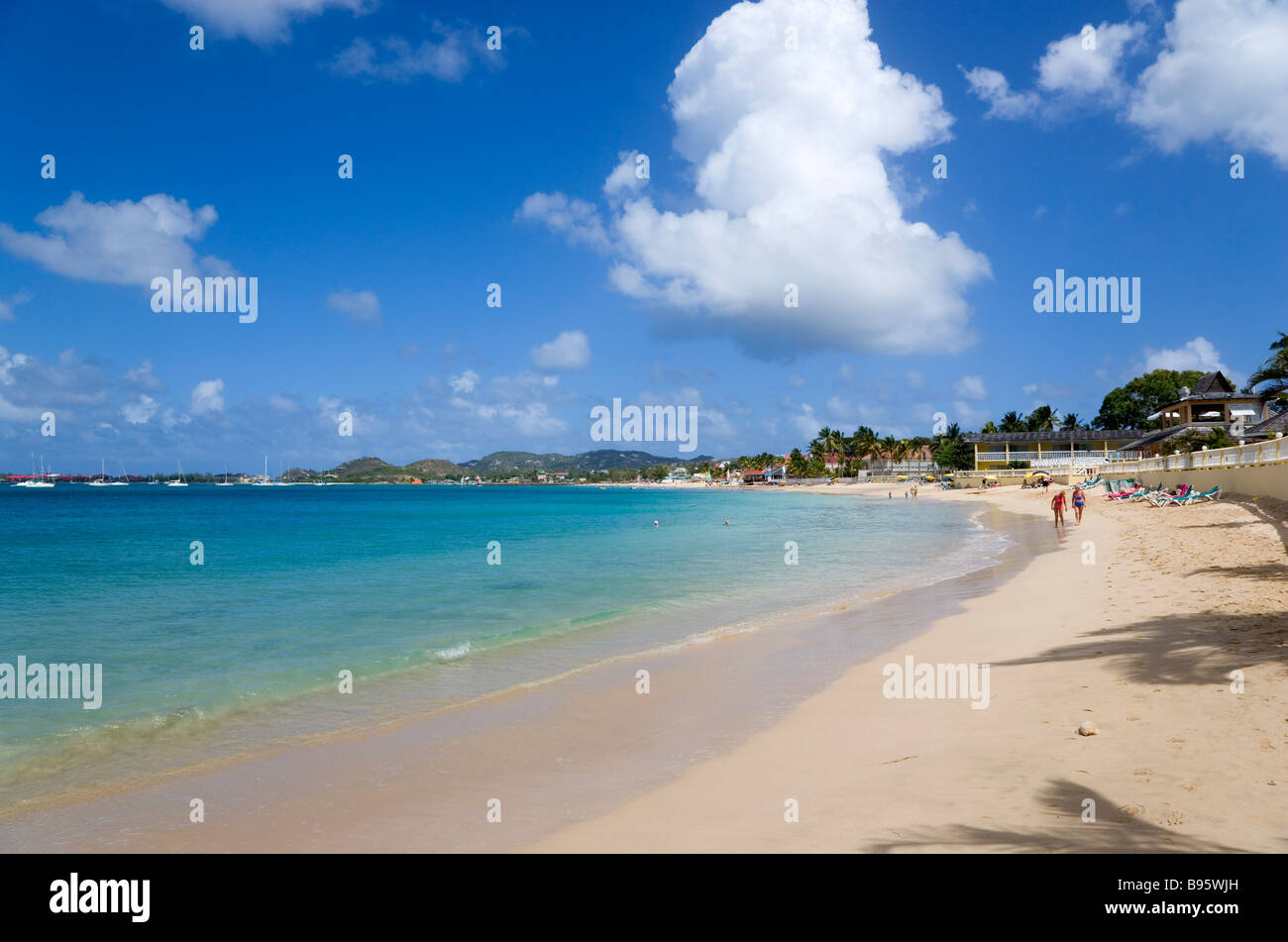 WEST INDIES Caribbean St Lucia Gros Islet Reduit Beach in Rodney Bay with tourists in the water
