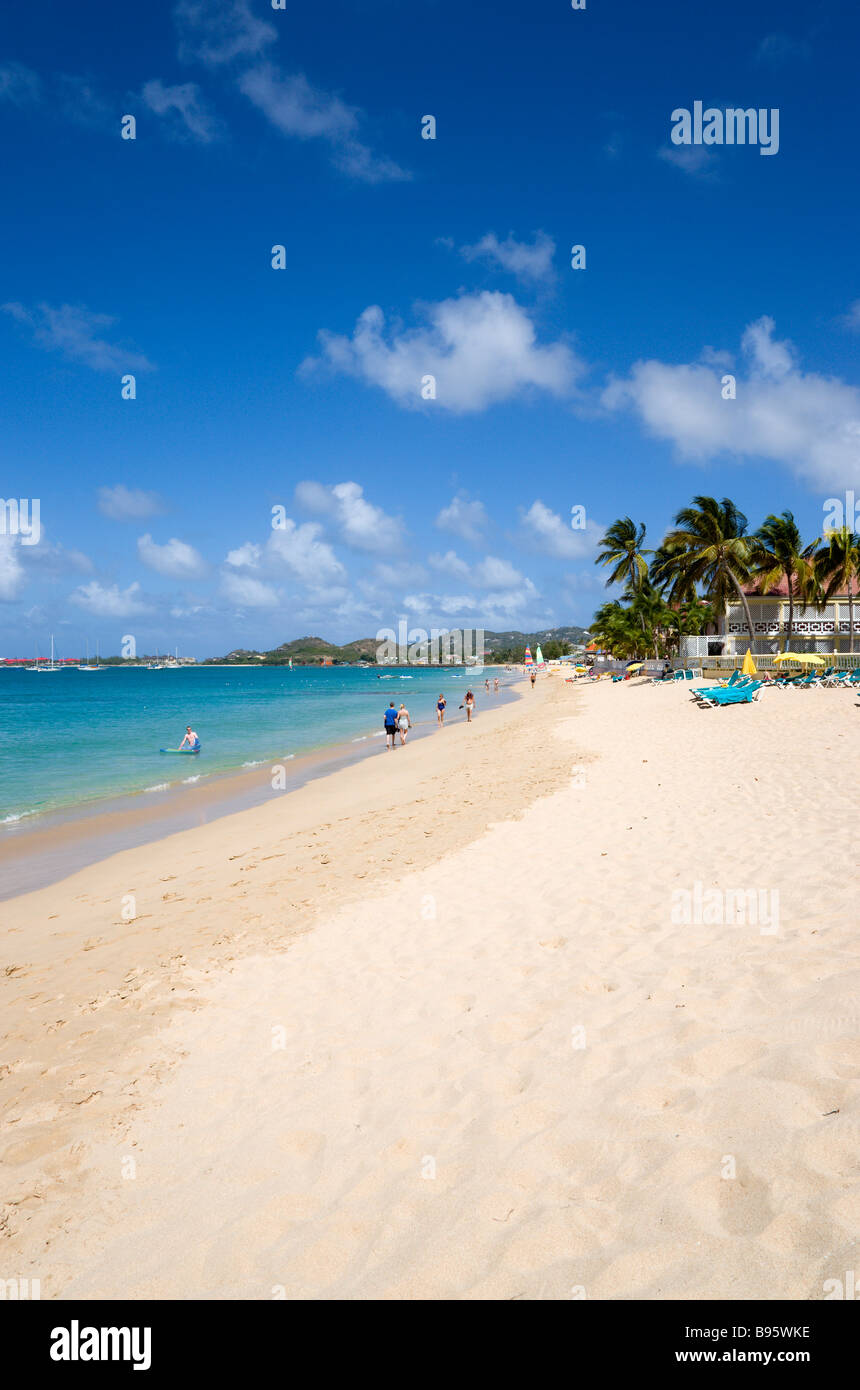 WEST INDIES Caribbean St Lucia Gros Islet Reduit Beach in Rodney Bay Tourists in water and on