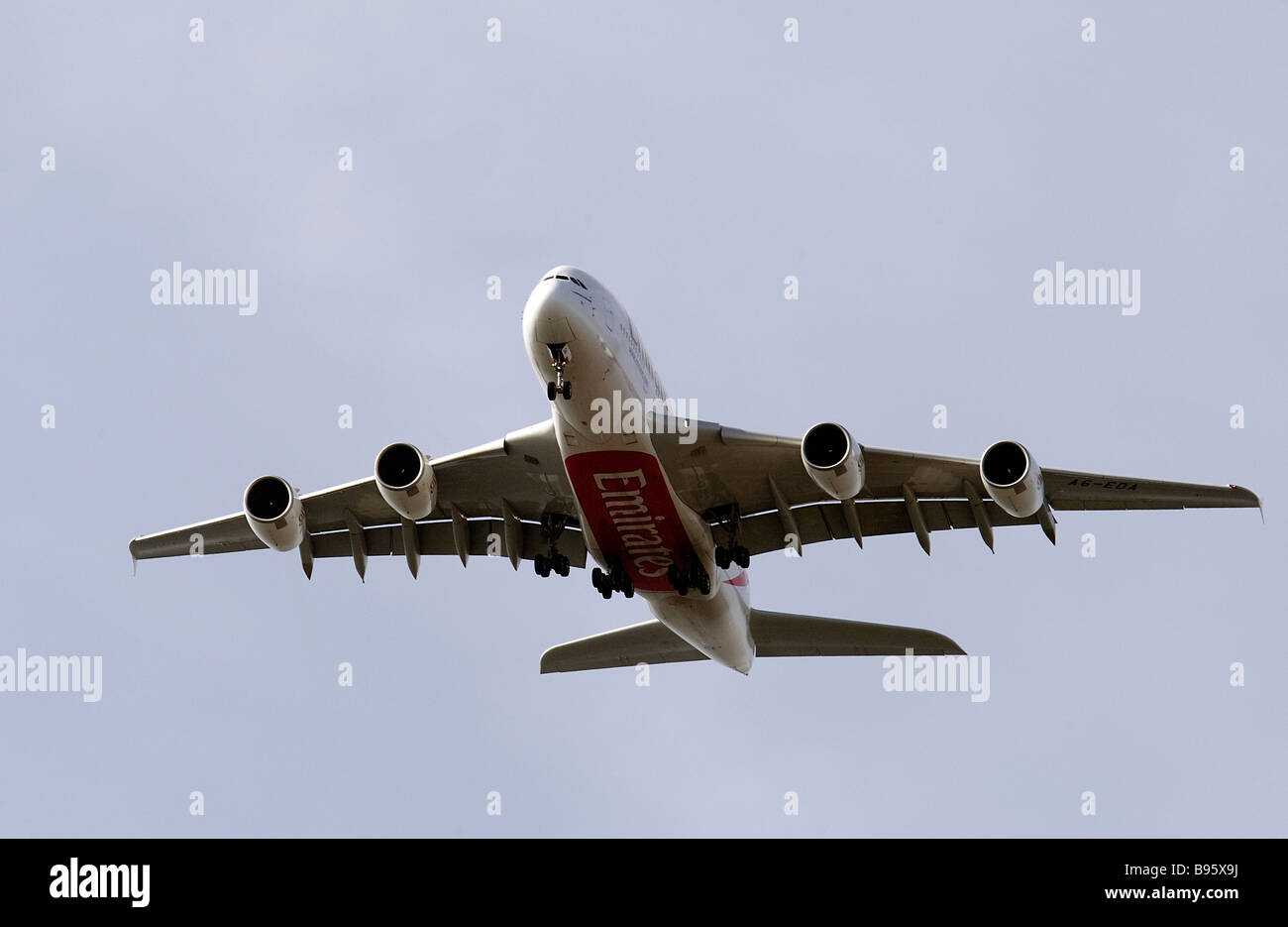 Emirates Airways new Airbus A380 long haul passenger aircraft prepares to land at London's Heathrow Airport Stock Photo