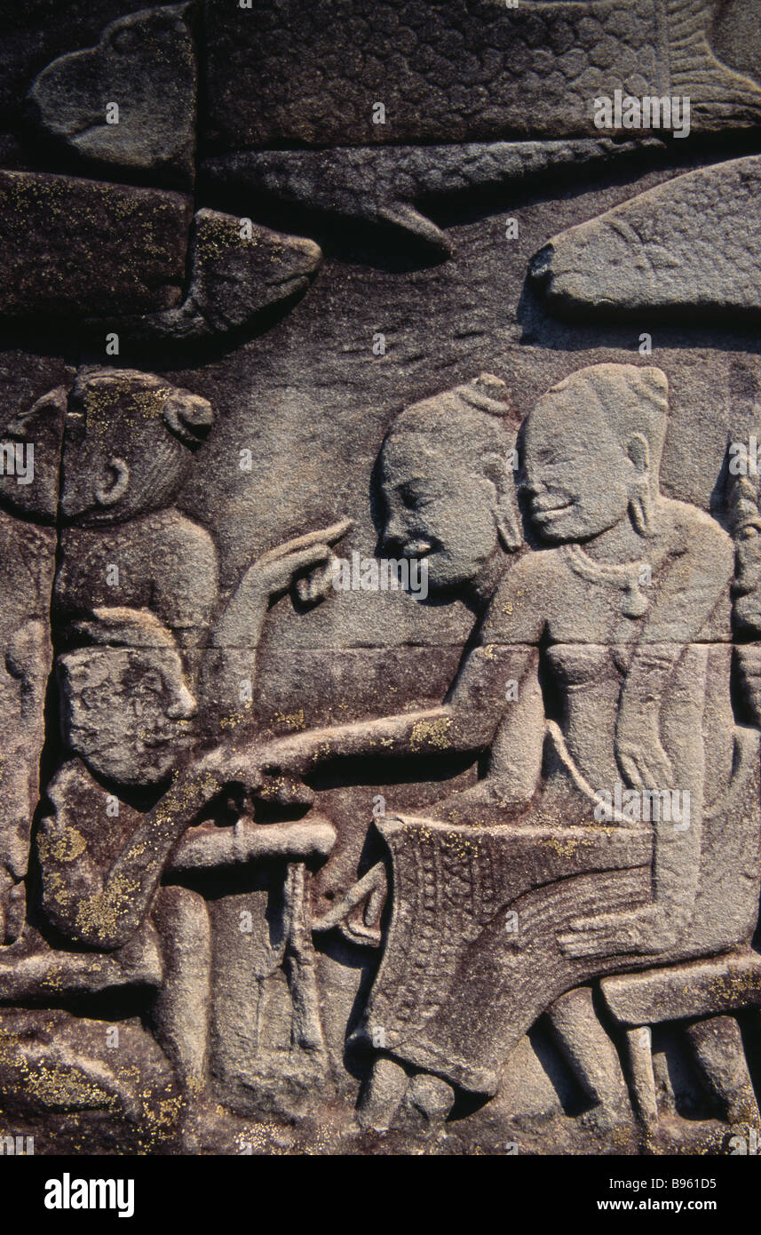 CAMBODIA Siem Reap Province Angkor Thom Bayon Temple Bas relief carvings on  south wall depicting everyday scene of Fish market Stock Photo - Alamy