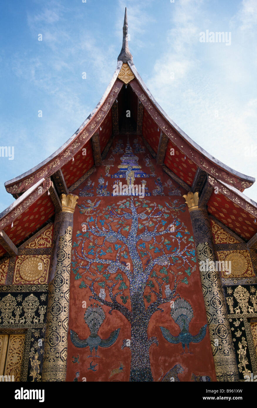 Xieng Tree LAOS Luang Prabang Wat Xieng Thong. Ornate temple exterior with Tree of ...