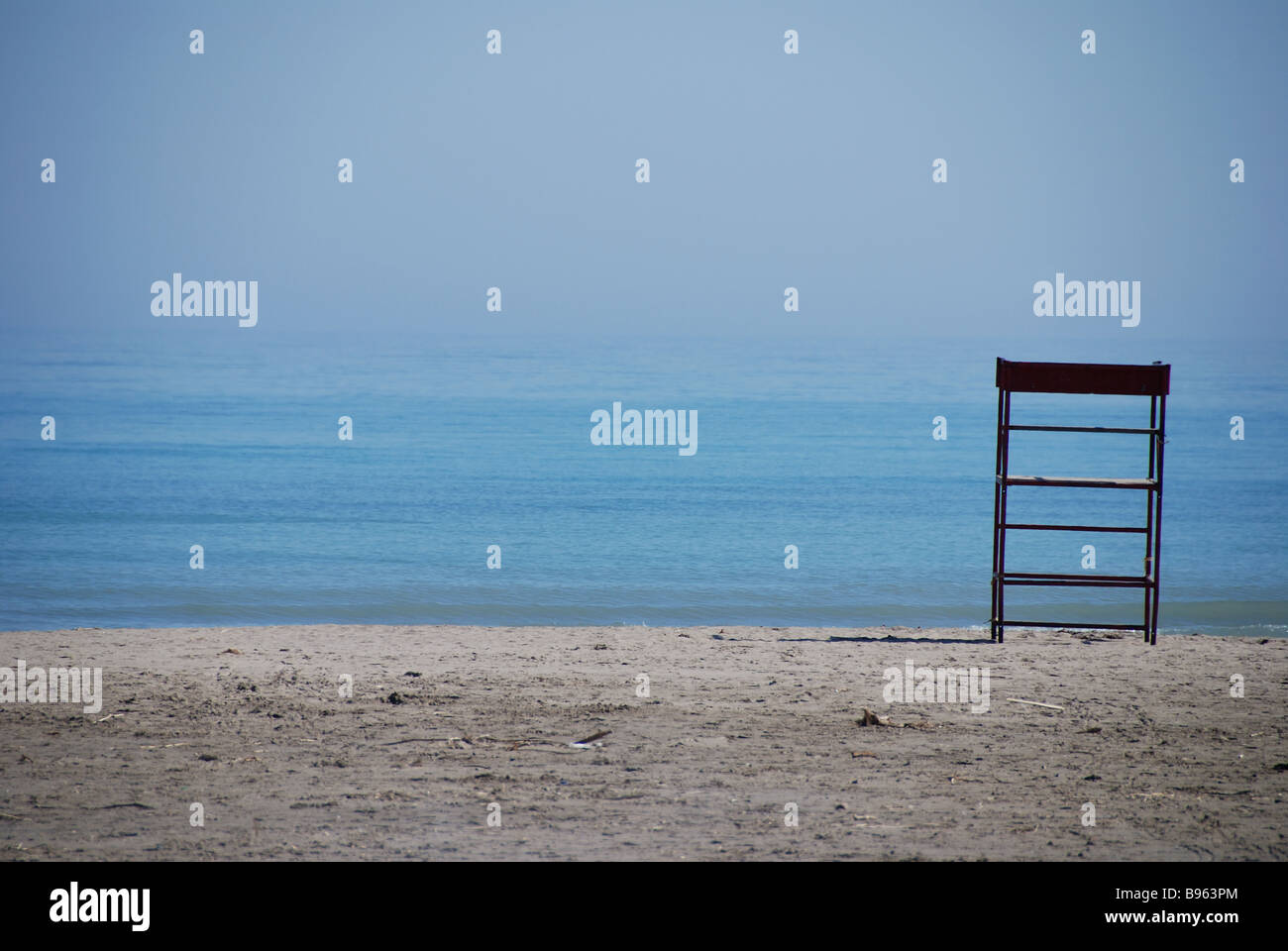 An empty lifeguards chair on the Scarborough bluffs beach on the shores of Lake Ontario in Toronto Canada Stock Photo