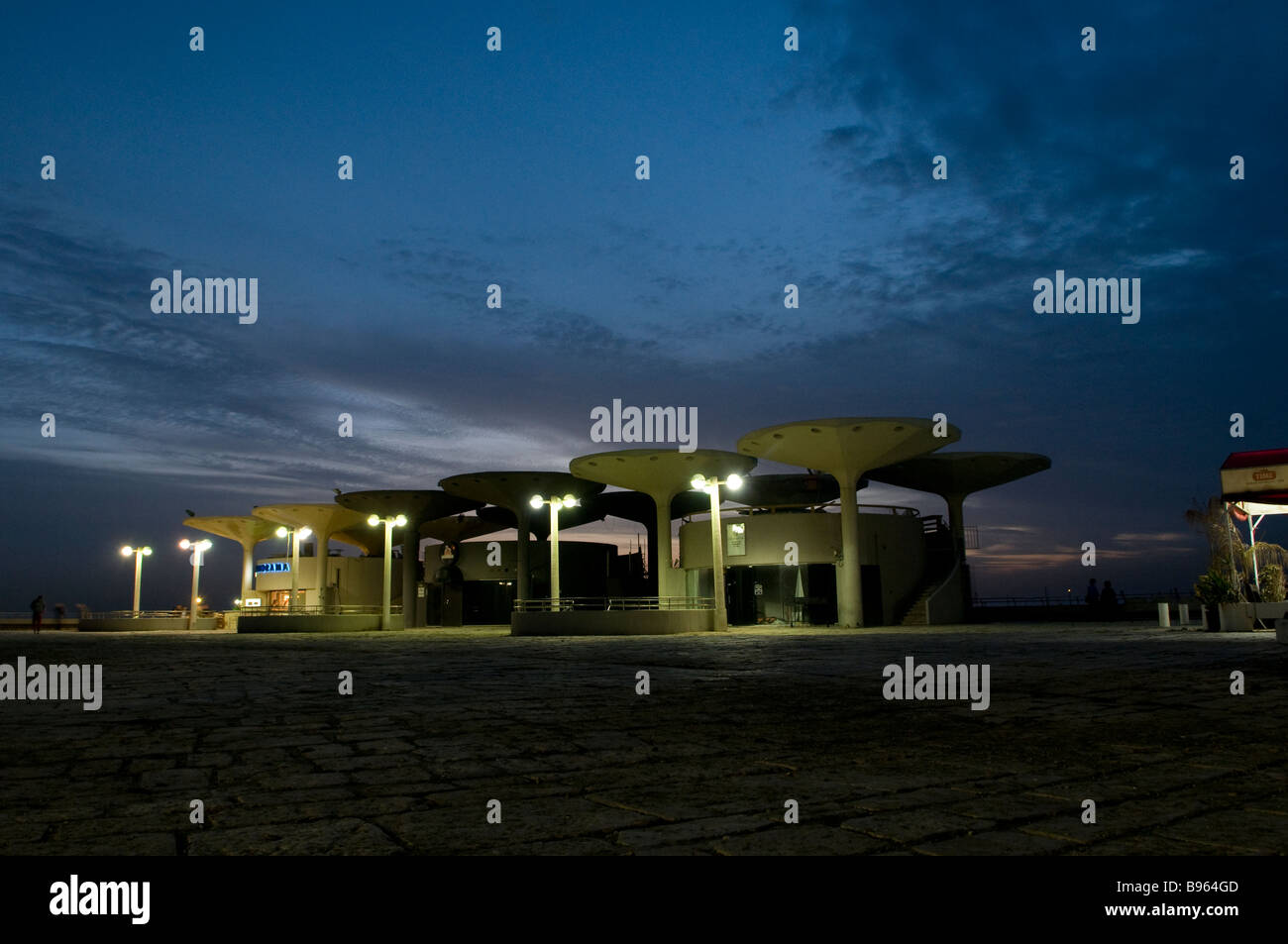 View at night of Kikar Atarim square complex in Tel Aviv Israel Stock Photo
