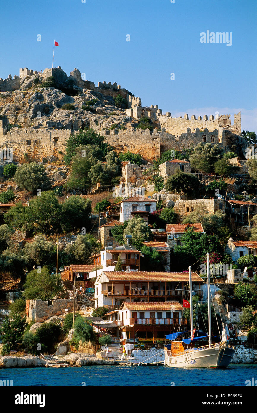 Turkey, Turkish Riviera, Antalya, Kale (Simena), fortress of Kale and  harbor Stock Photo - Alamy