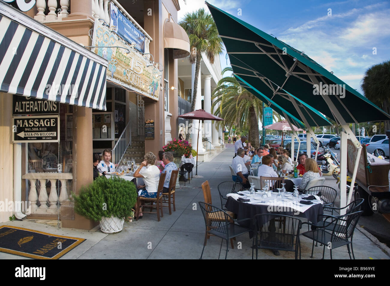 Outdoor restaurant at St Armands Circle shopping and dining area on St Armands Key in Sarasota Florida Stock Photo