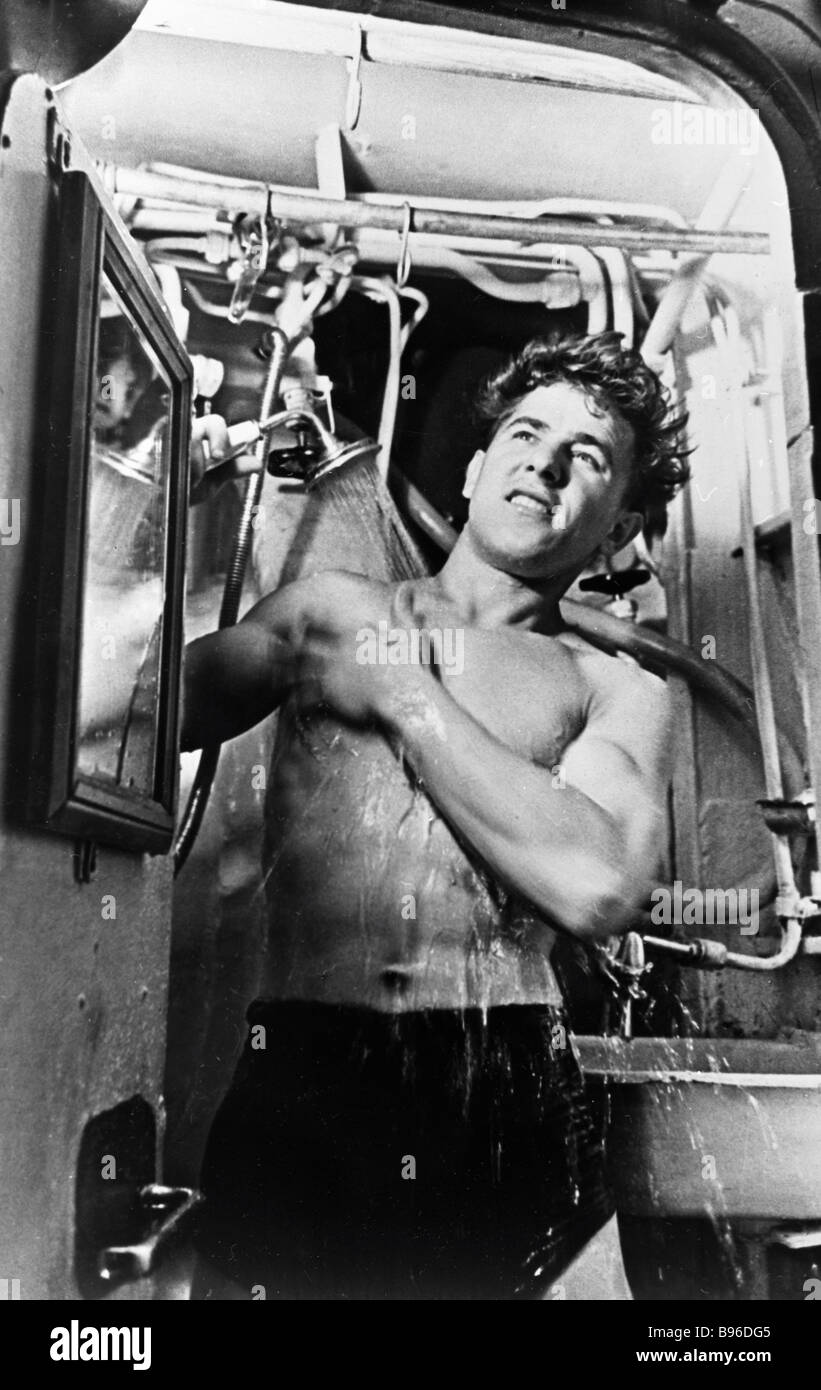 A nuclear submarine sailor taking a shower after watch Stock Photo Alamy