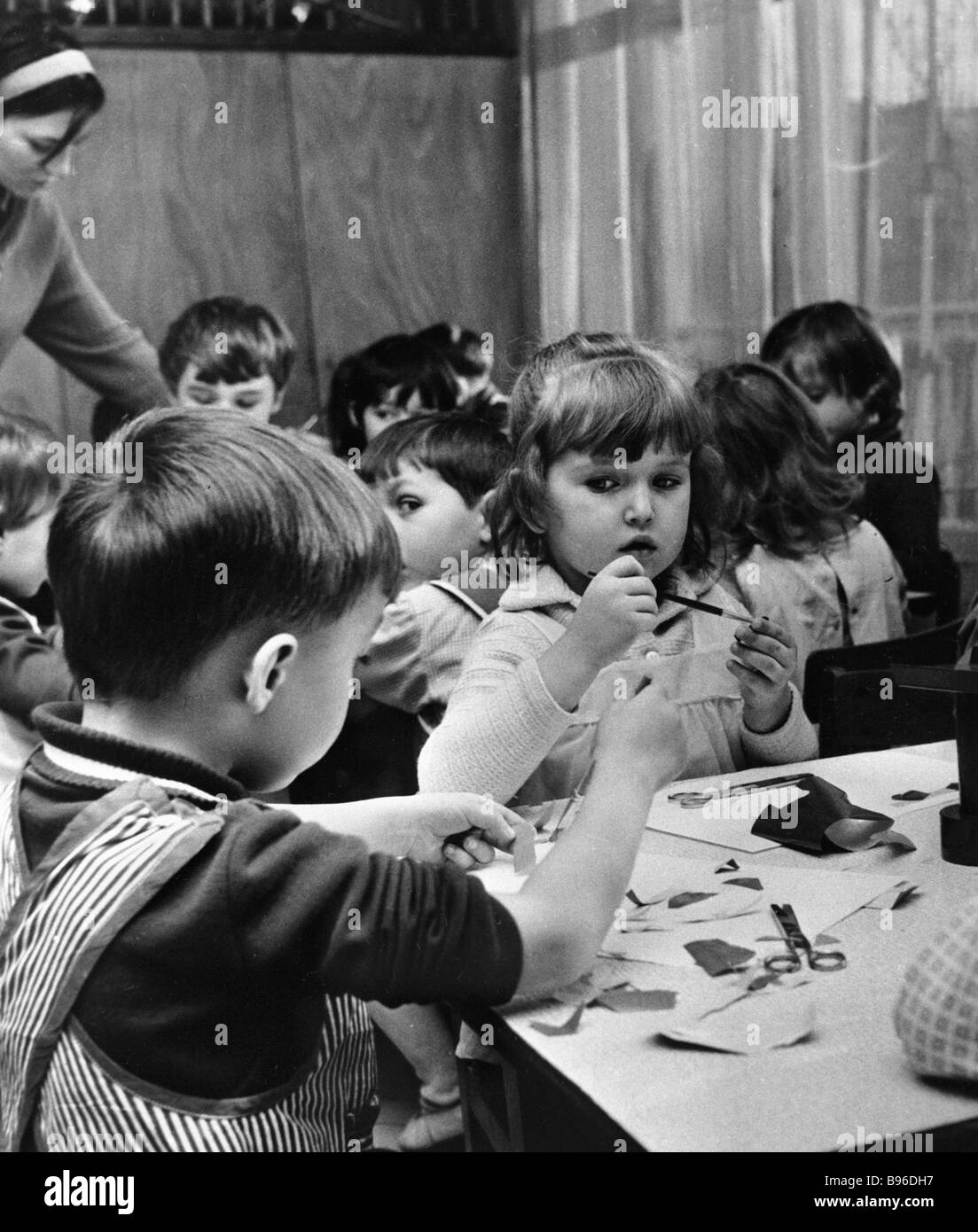 Children learning applique technique at the kindergarten Stock Photo