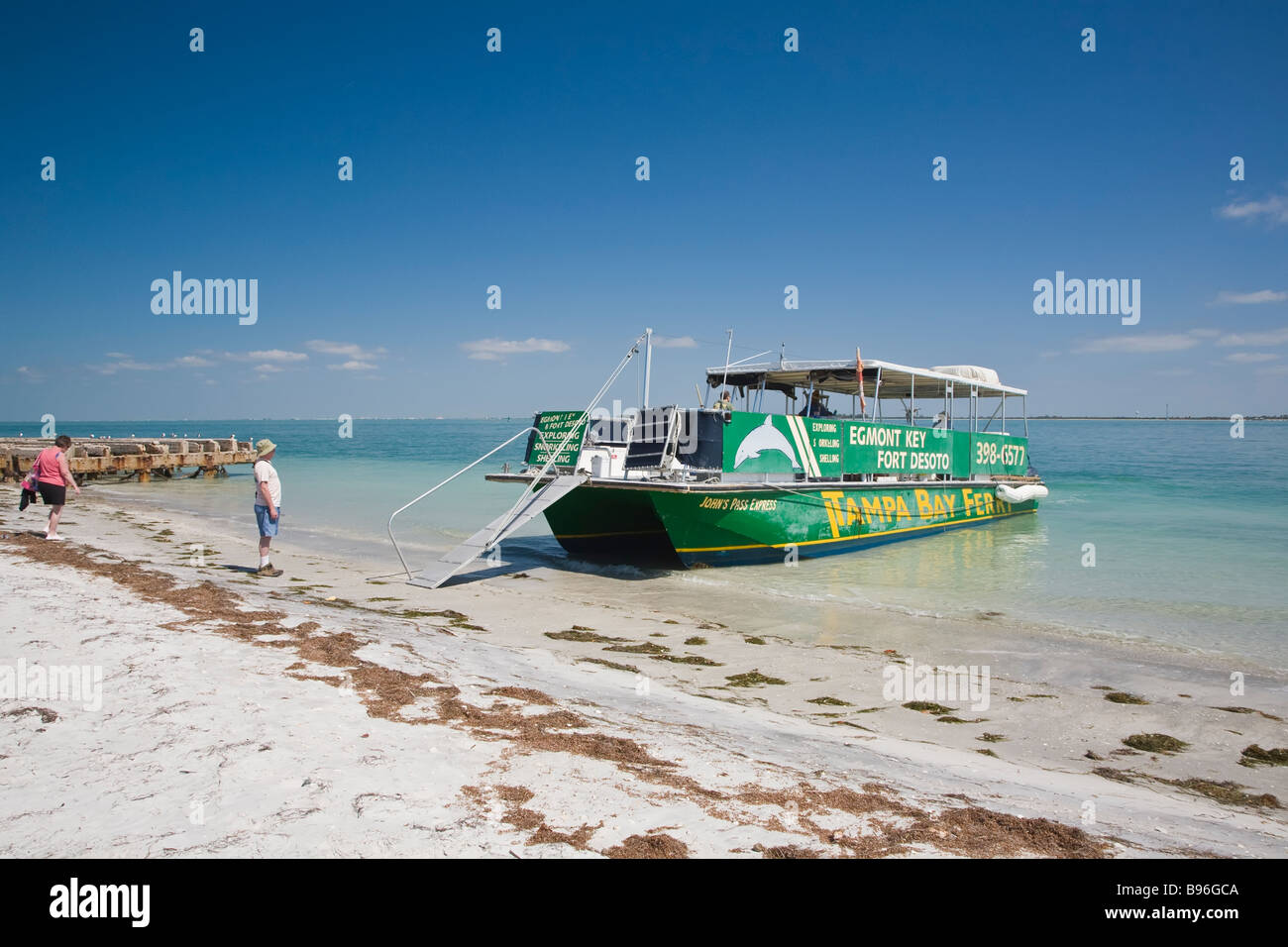 Tour boat on beach on Egmont Key Stae Park at the entrance to Tampa Bay
