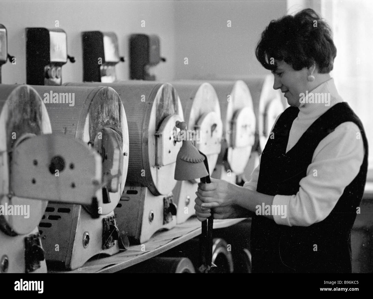 An artisan making Dymkovo painted clay figurines Stock Photo Alamy