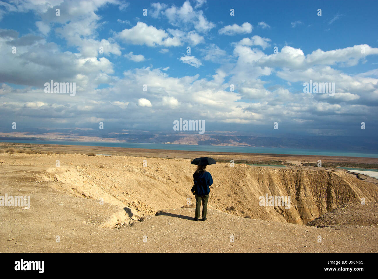 View from high plateau overlooking Dead Sea to Jordan at Qumran National Park where Bedouin shepherds found Dead Sea Scrolls Stock Photo