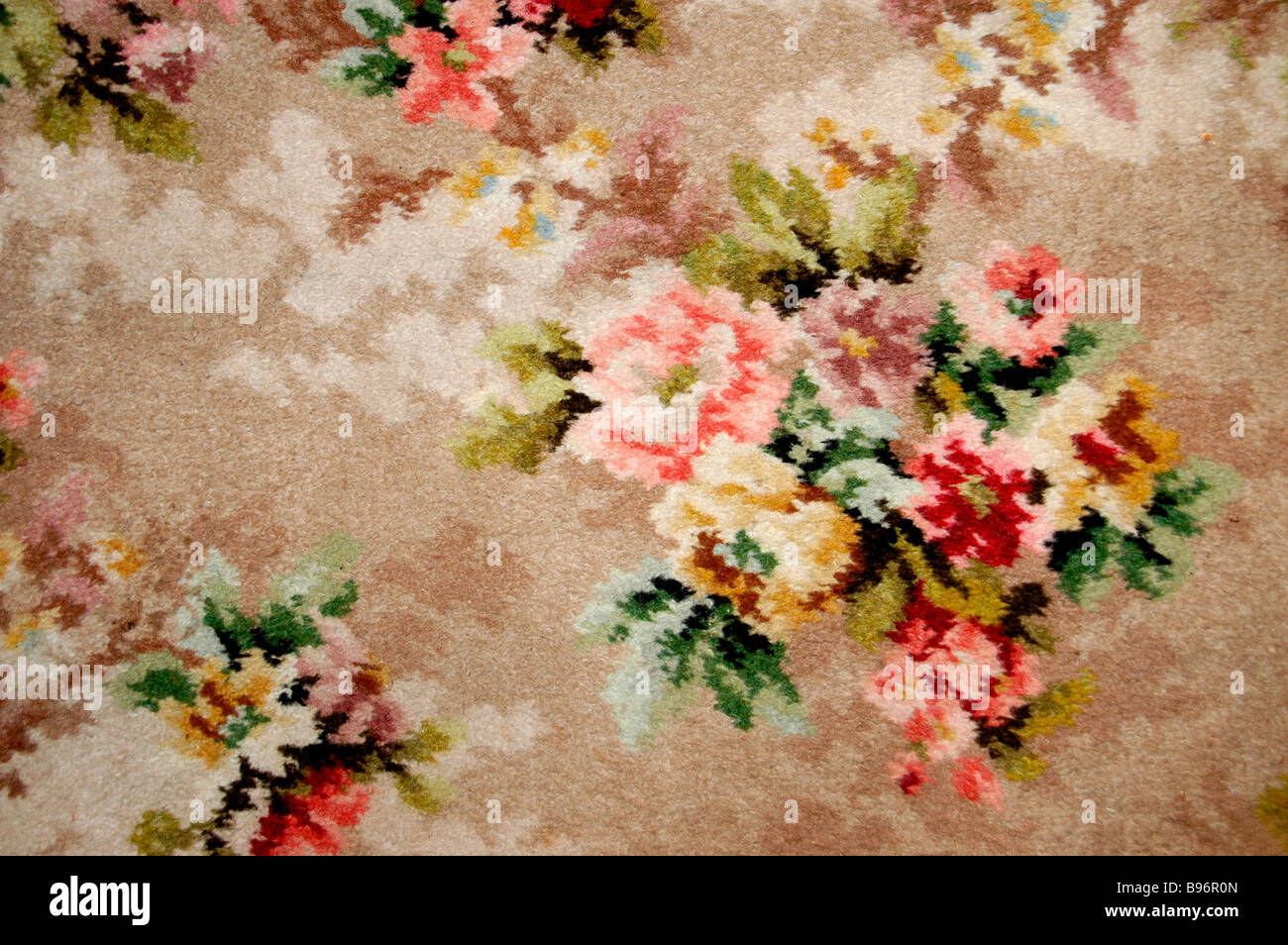 Floral detail of a woolen carpet. Stock Photo