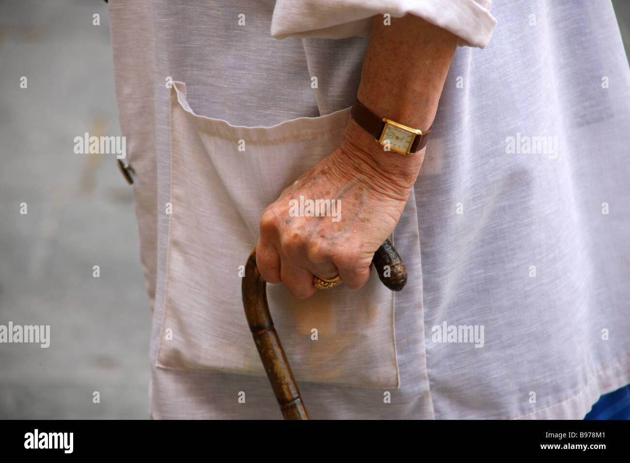 60 years old woman walking stick hi-res stock photography and images ...