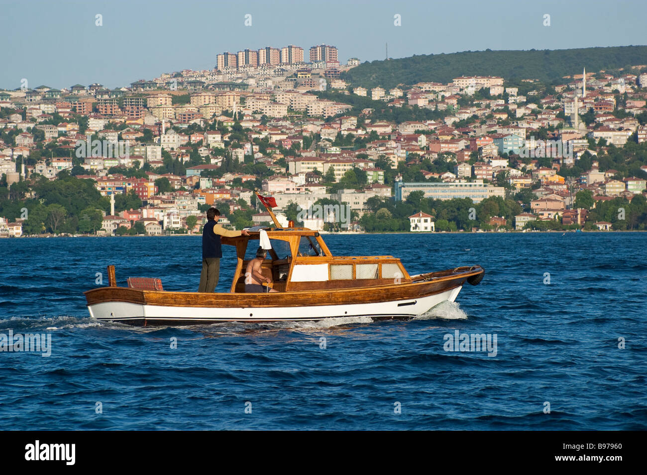 Small White Motor Fishing Boat with Wooden Helm, Simple Small Cabin in  Front Stock Image - Image of harbor, boat: 122872067