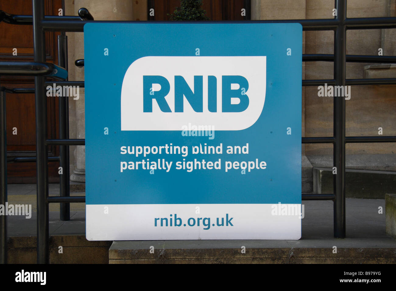 The sign outside the Royal National Institute of Blind People head office in Euston London. March 2009 Stock Photo
