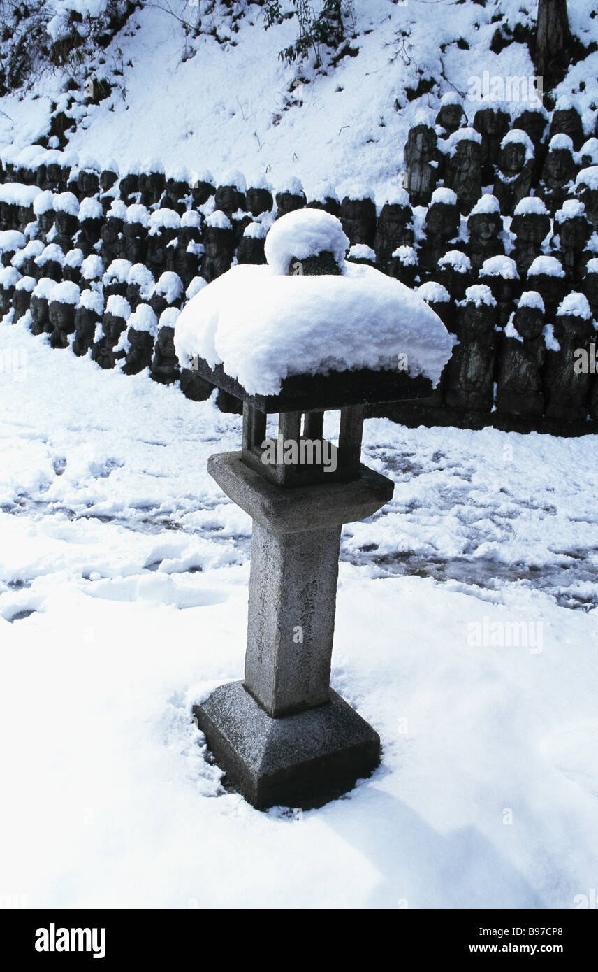 Snow and stone lantern Stock Photo - Alamy