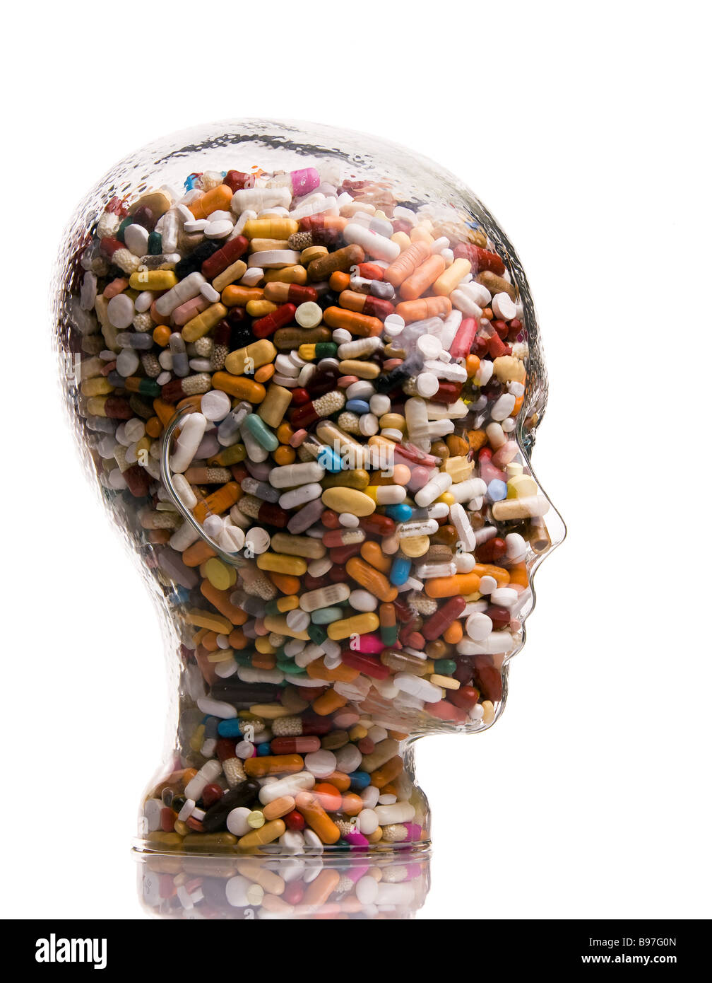Tablets in a head made of glass Stock Photo Alamy