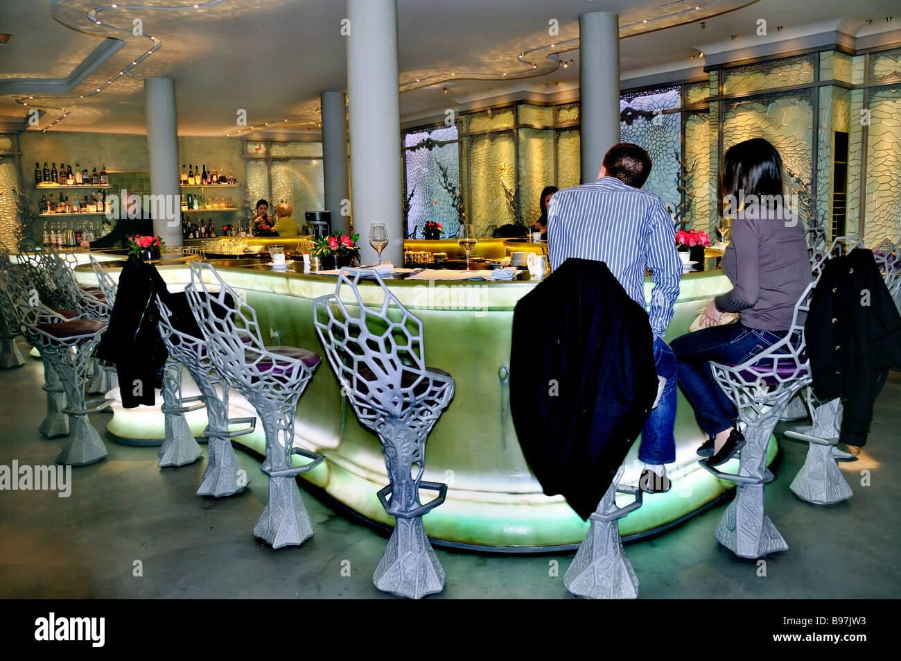 Paris France, Couple, Sharing  drinks Inside French Cafe Bar, French Bistro , Contemporary, 'Laduree', Trendy Stock Photo