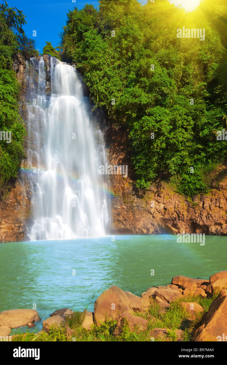 Bo Bla Waterfall with rainbow in rain forest Stock Photo