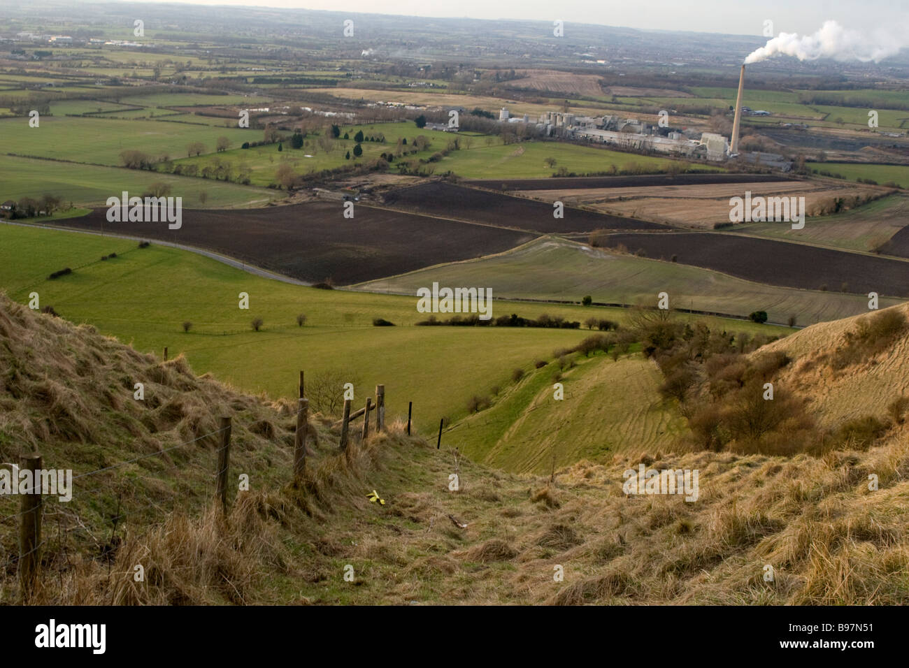 View of a cement works factory from Westbury Whitehorse, Wiltshire. Stock Photo