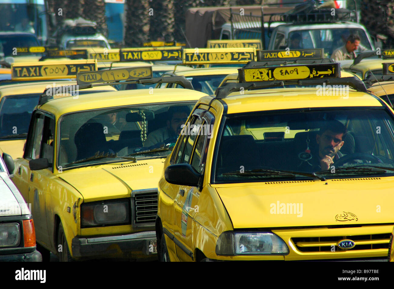 Traffic jam taxi driver cars Damascus Syria work public transport Stock