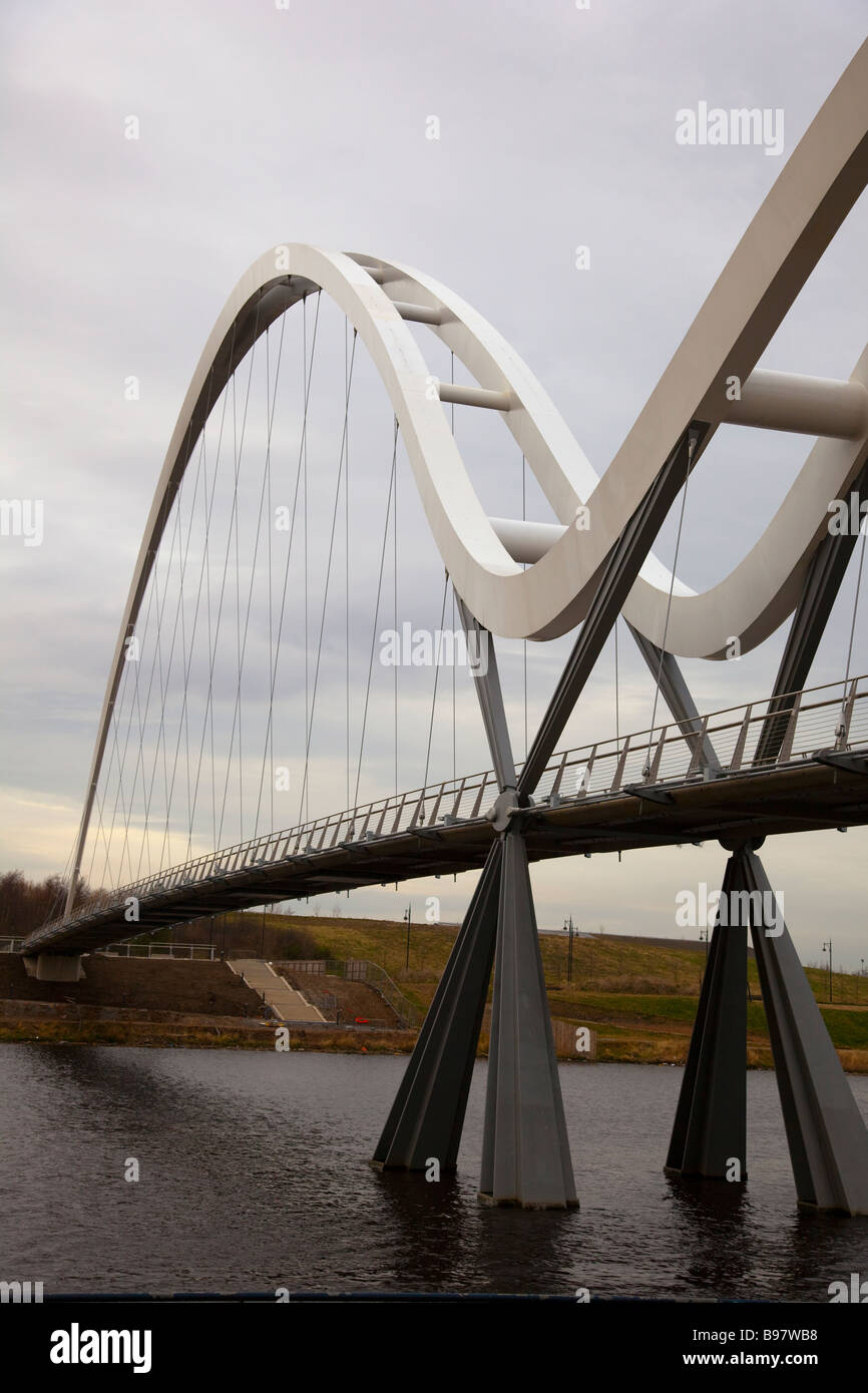 Infinity pedestrian and cycle bridge. Footbridge with mathematical asymmetrical arches in Thornaby-on-Tees, Middlesborough, Teesside. Stock Photo