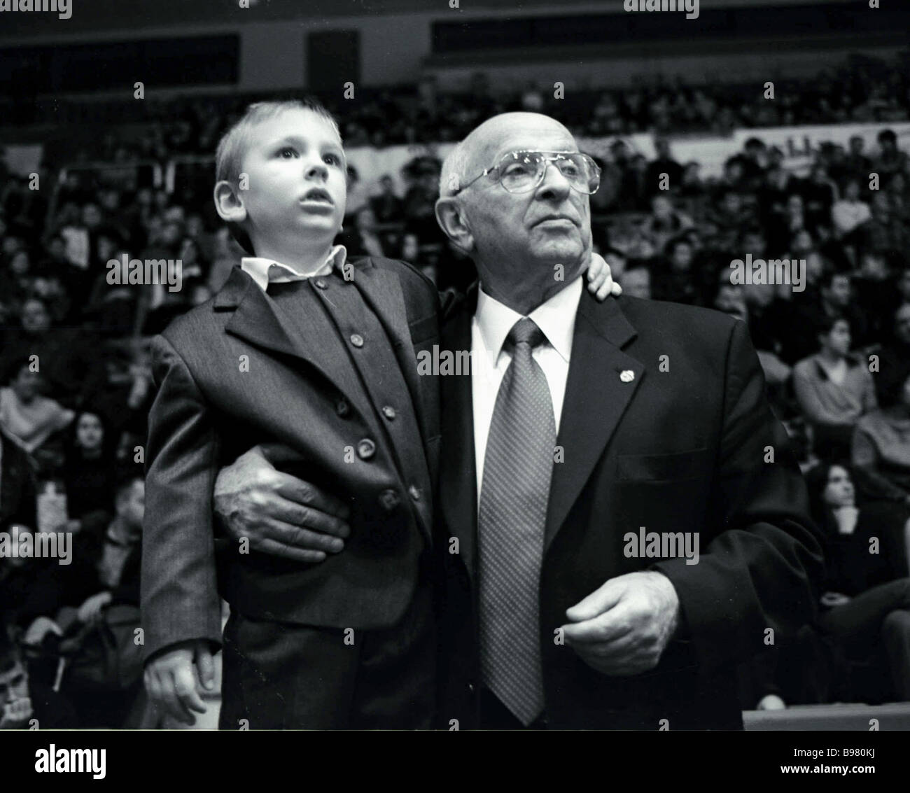 Alexander Gomelsky TsSKA basketball club president and Vitali his little  son watching a Russian Basketball Super League meet of Stock Photo - Alamy