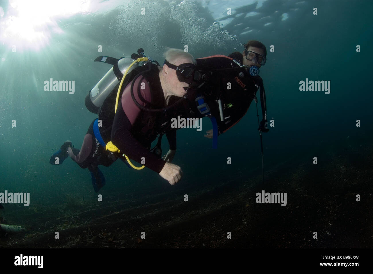 Underwater. Scuba Diving. Introductory dive for 78year old man. Retak