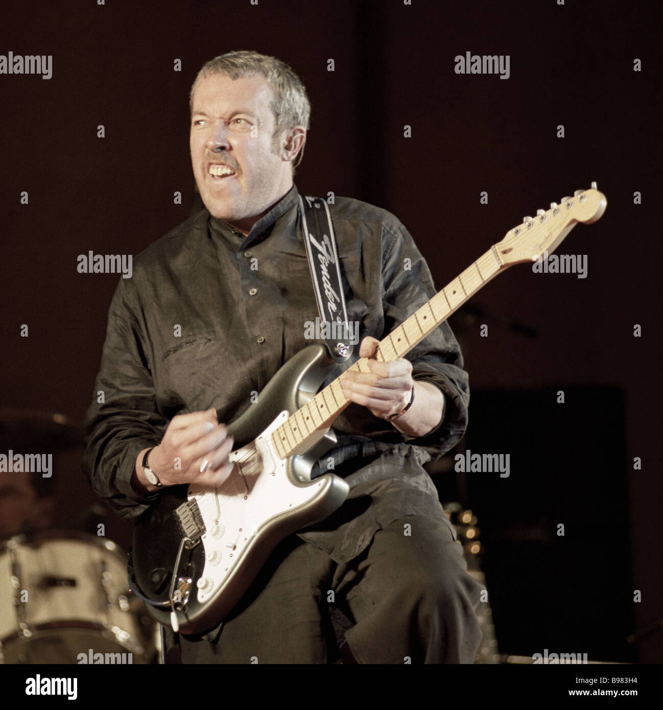 Rock star Andrei Makarevich during a concert of his cult group Mashina 