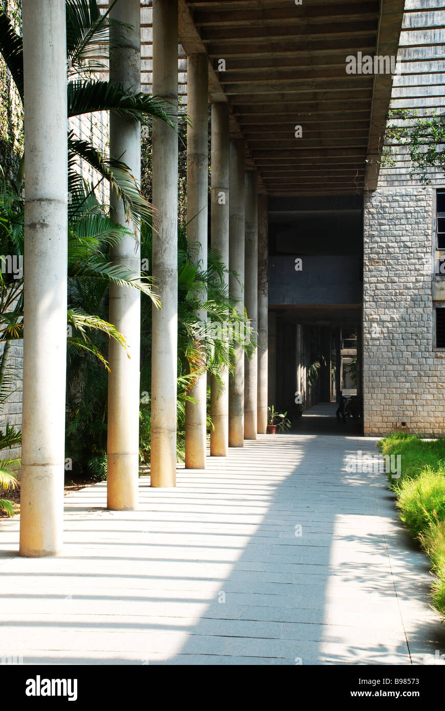 A building with big pillars in bangalore Stock Photo Alamy