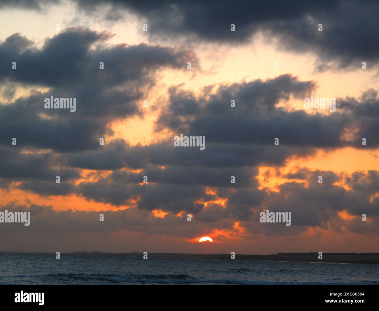 A sunset at the South Atlantic ocean Stock Photo - Alamy