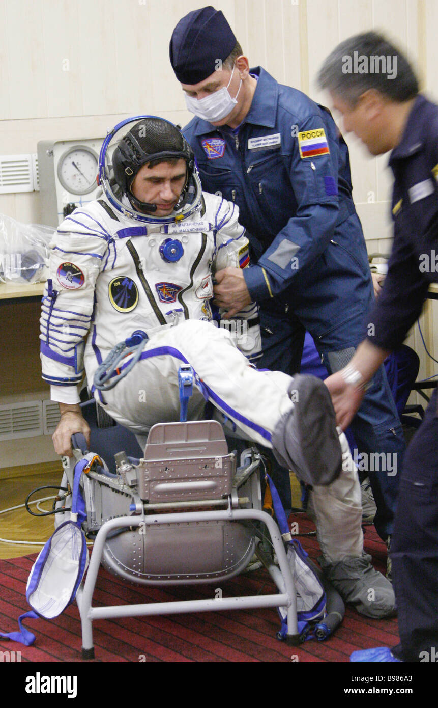 Russian cosmonaut Yuri Malenchenko during the check of spacesuits