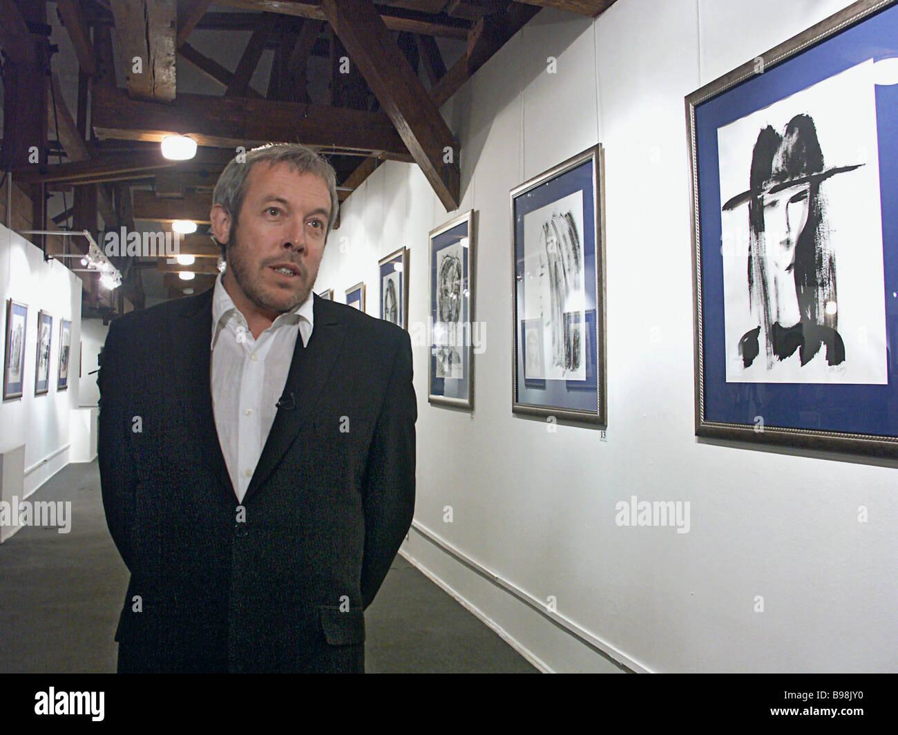 Singer and composer Andrei Makarevich at his exhibition 50 Women of