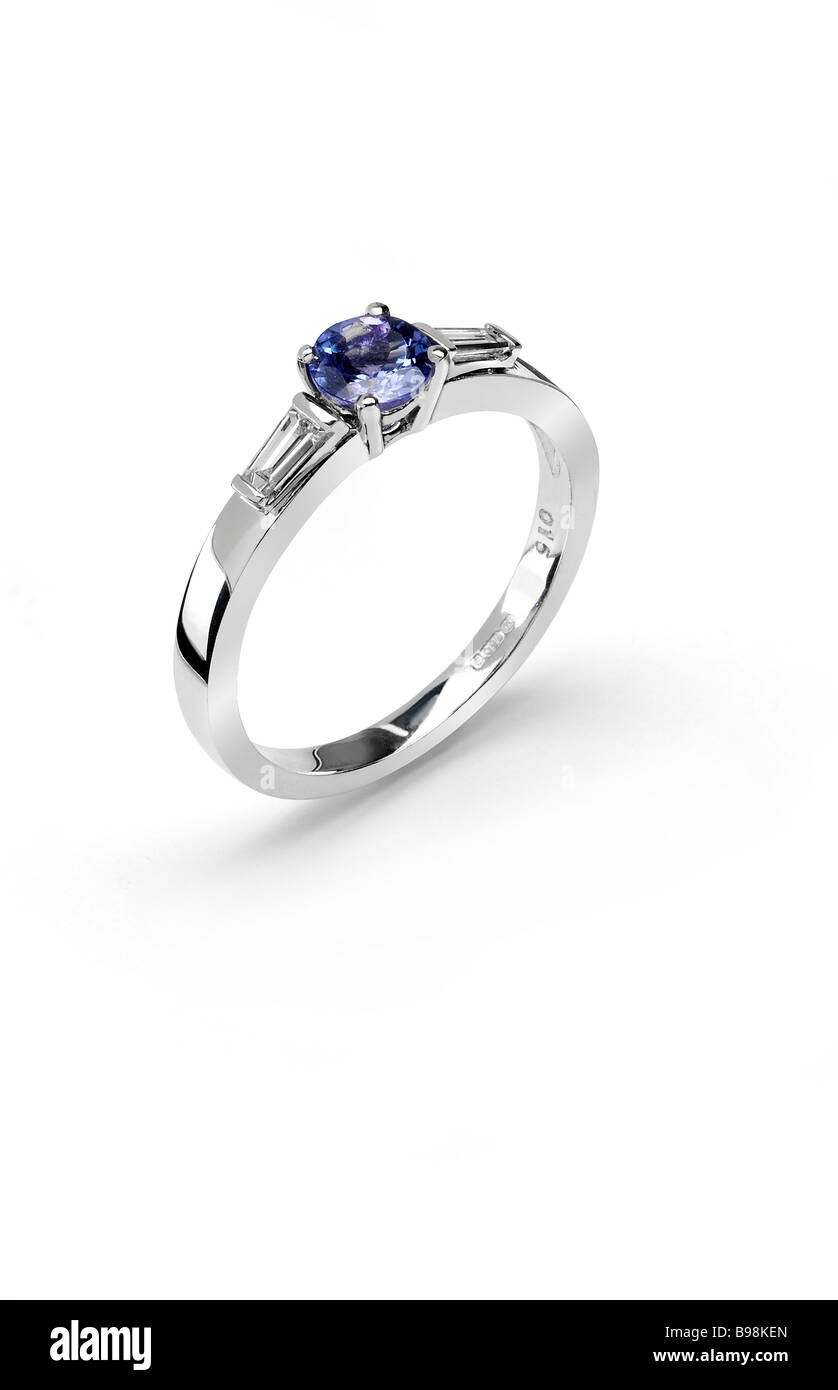 Tanzanite engagement ring in white gold with diamond shoulder set stones Stock Photo