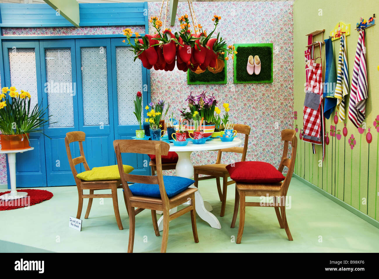 A brightly coloured room is decorated for display in traditional Dutch style at Keukenhof Gardens in Lisse, The Netherlands Stock Photo