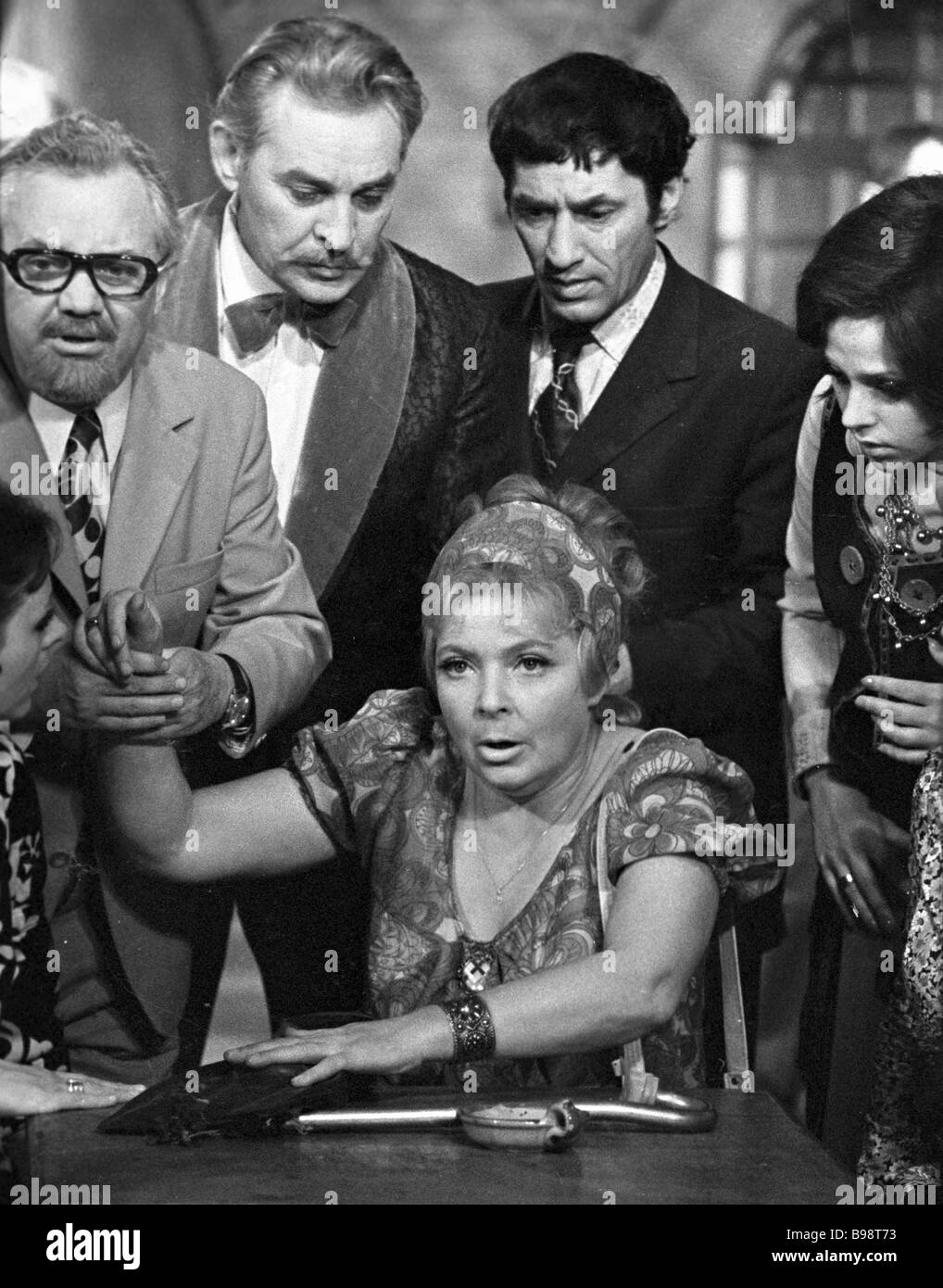 Actors Olga Aroseva sitting Boris Runge left and Spartak Mishulin