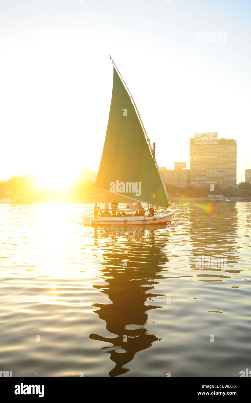 Egypt Cairo felucca sailboat on the Nile River at dawn Stock Photo