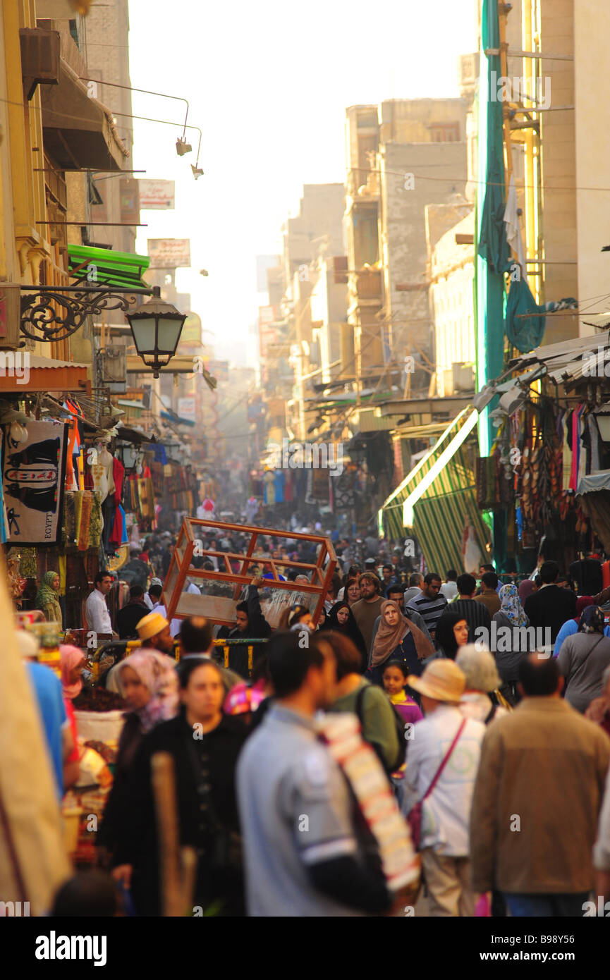 Egypt Cairo Khan El Khalili Bazaar market souk crowded with tourists and shoppers souvenirs food Stock Photo