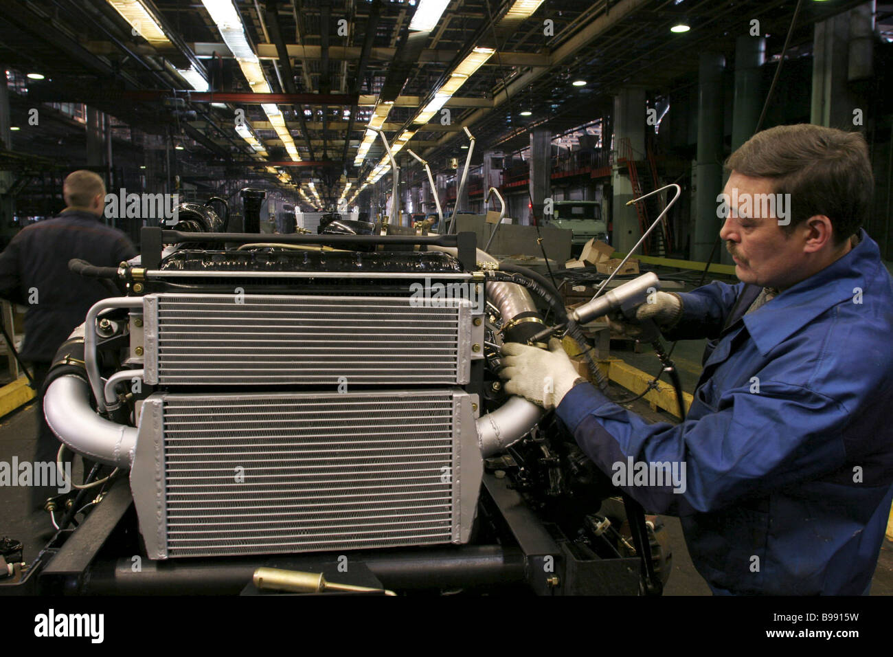 Car Radiator Factory Installing truck radiator at I A Likhachev auto factory Stock Photo - Alamy