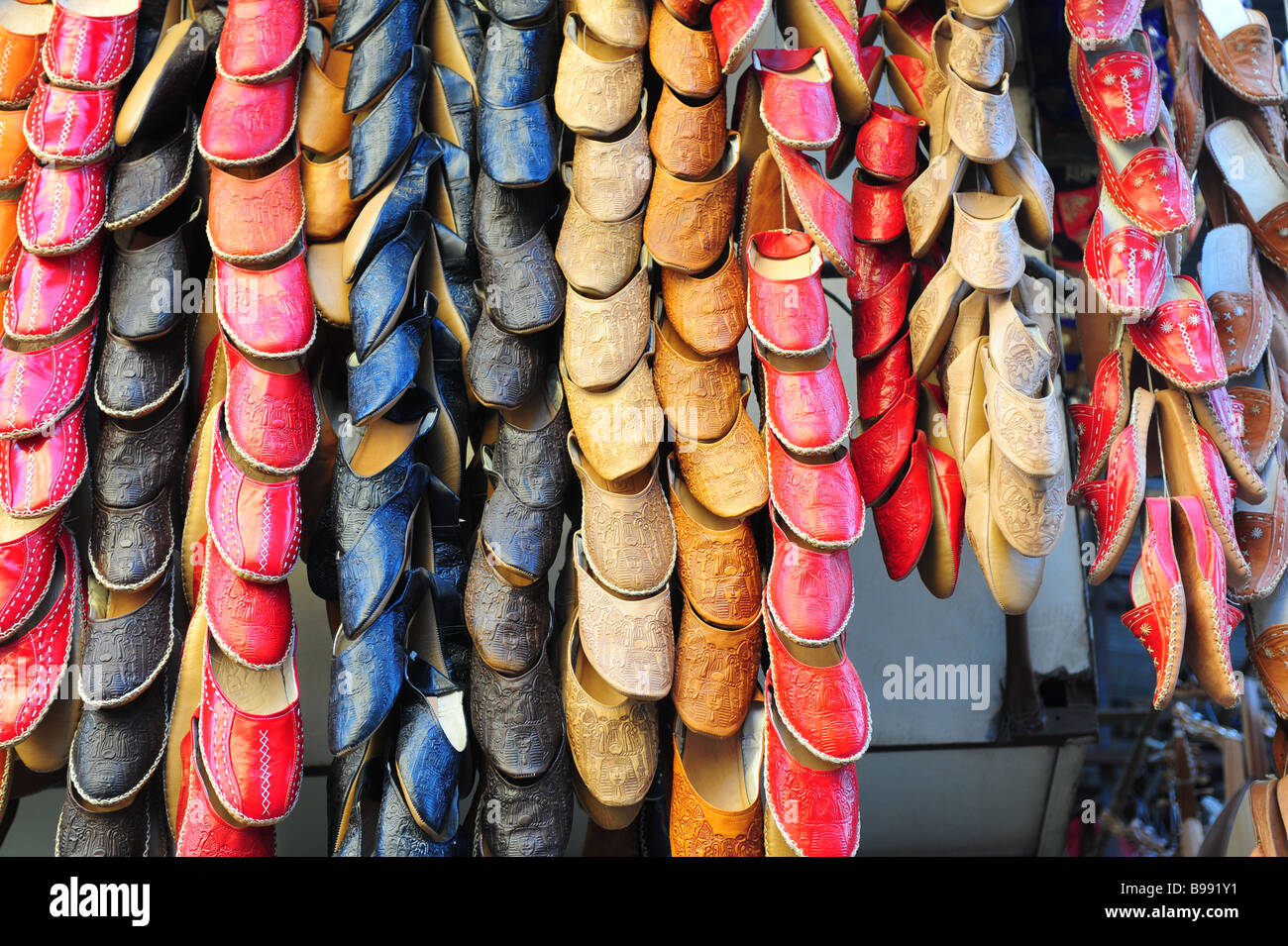 Egypt Cairo Khan El Khalili Bazaar market souk crowded with tourists and shoppers souvenirs