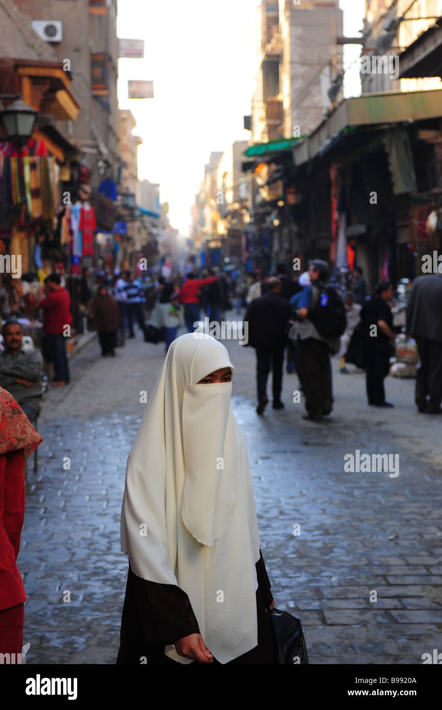 Egypt Cairo Khan El Khalili Bazaar market souk Muslim woman covered Stock Photo