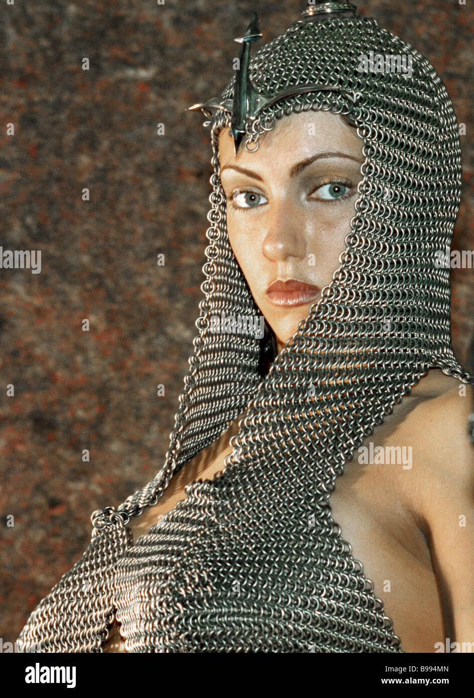 A model demonstrating a coat of mail designed by Moscow artist Sergei