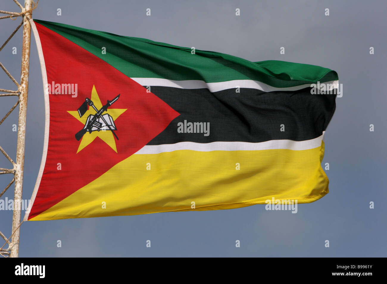 The flag of Mozambique flies in the southern African country s capital Maputo. Stock Photo