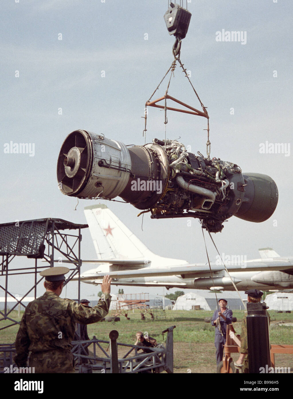 Dismantling engines of the TU 95 aircraft Stock Photo - Alamy
