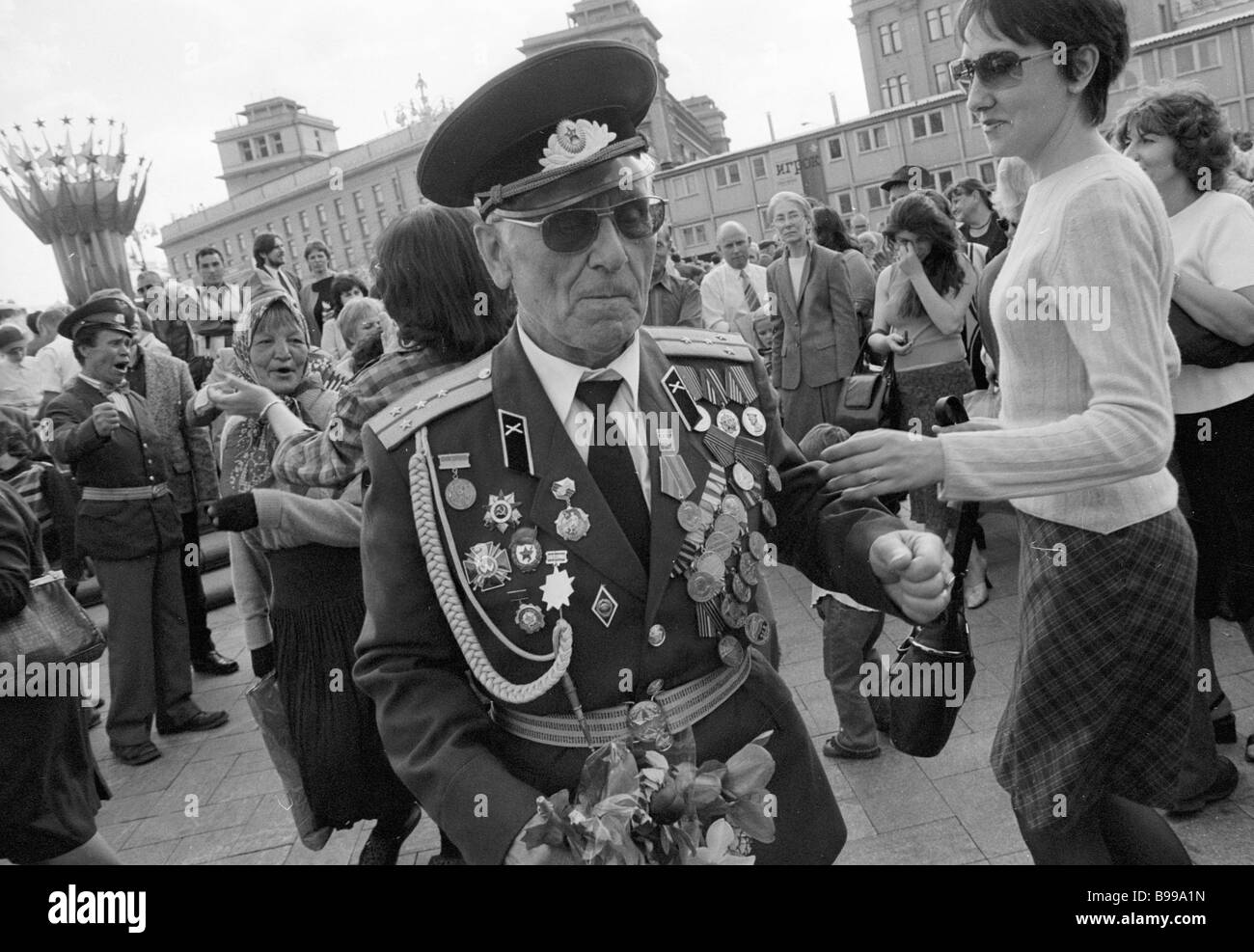 World War II veterans meeting in the public garden outside the Bolshoi ...