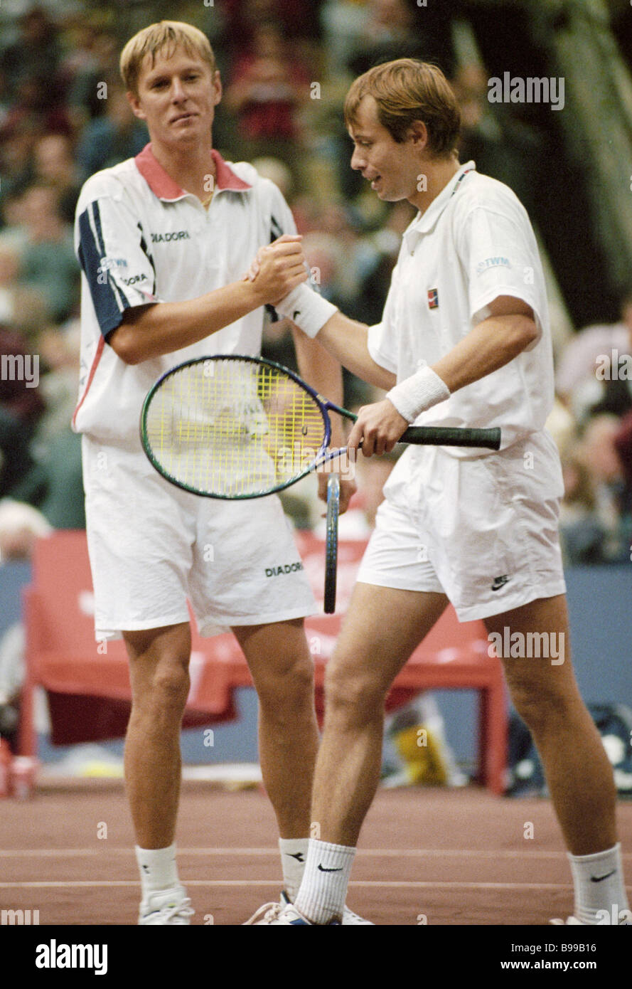 Tennis players Yevgeny Kafelnikov left and Andrei Olkhovsky during the  Davis Cup finals at the Olimpiisky sports complex Stock Photo - Alamy