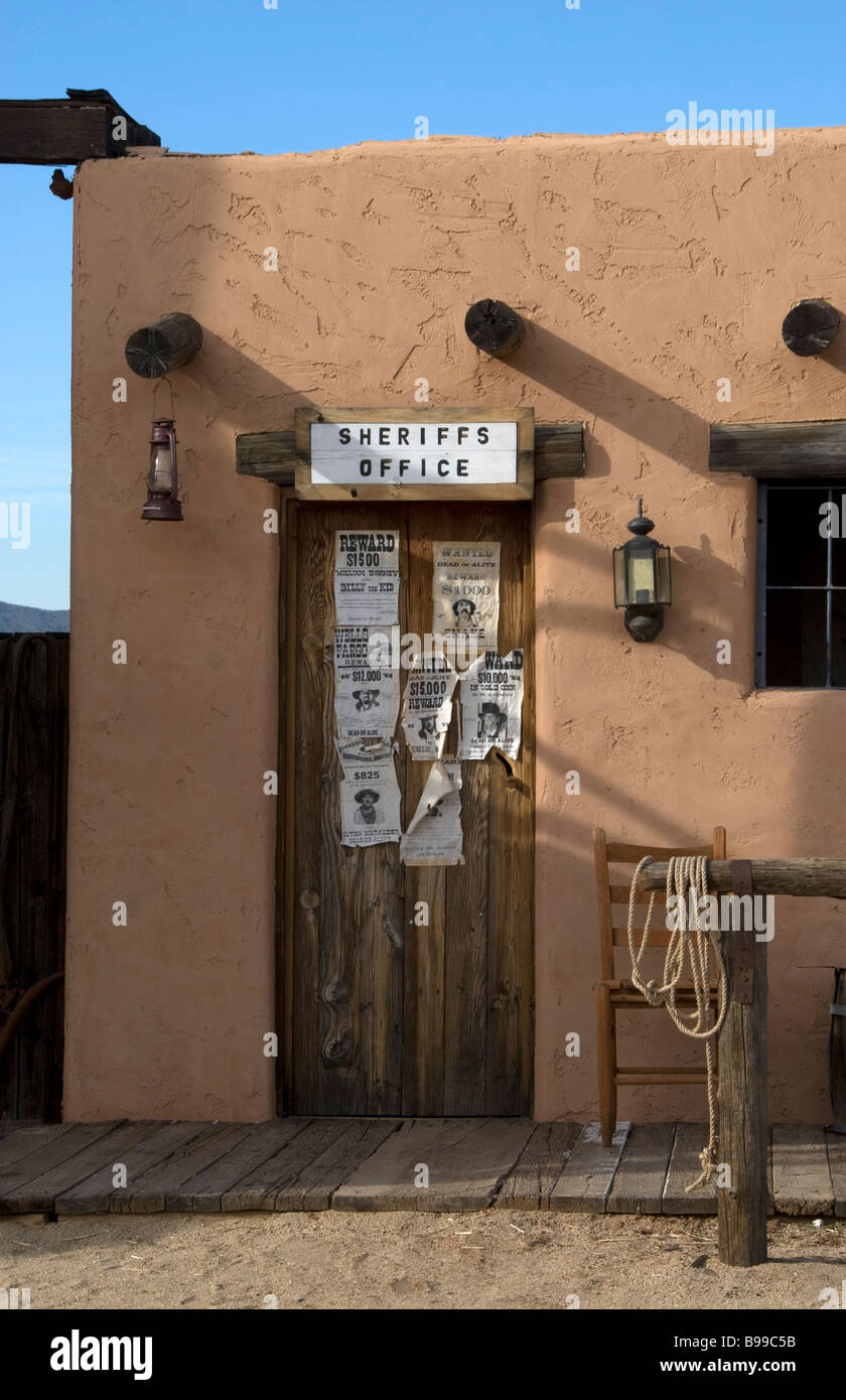 Old western Sheriff's office and jail with wanted posted on the door at the Pioneer Living History Village Museum in Phoenix, Arizona, USA. Stock Photo