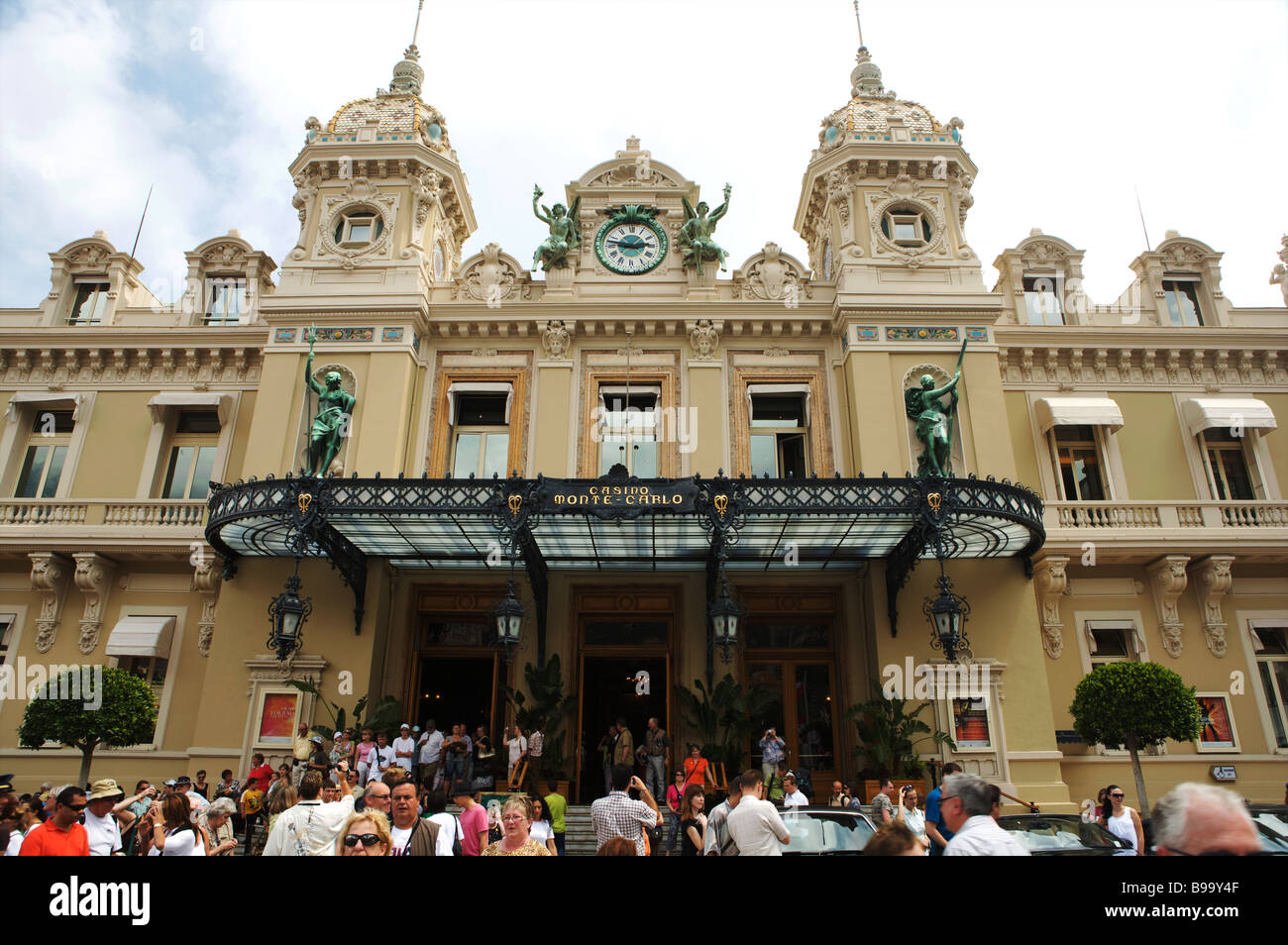 The Hotel de Paris with tourists outside in Casino Square Monte Carlo Monaco Stock Photo